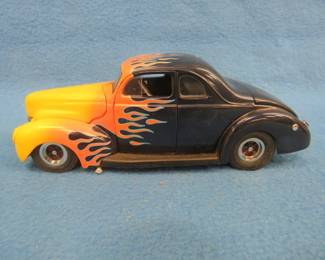 Lot 72. Danbury Mint 1940 Ford Hotrod. 1:24 scale die-cast car with original box.