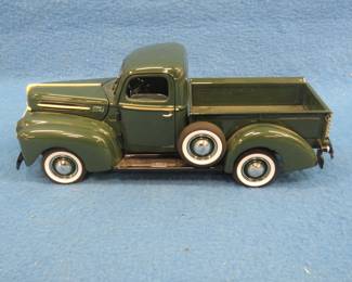 Lot 73. Danbury Mint 1942 Ford pickup. 1:24 scale die-cast car with original box.