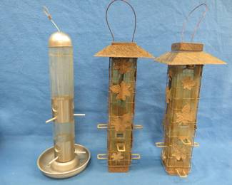 Lot 356. Three bird feeders. Two are squirrel-proof. Yeah right.