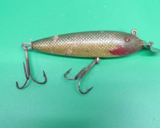 Lot 65. Pre-1915 CCBC 5" wooden Musky early edition with 2 line ties and glass eyes