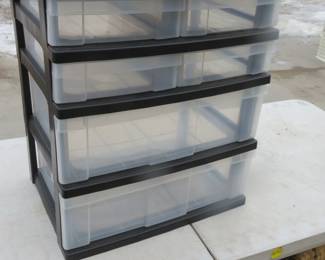 Lot 325. 4-drawer plastic cabinet