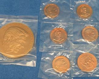 Lot 45. Ronald Reagan Presidential 3" dia. art medal and five copper colored medallions