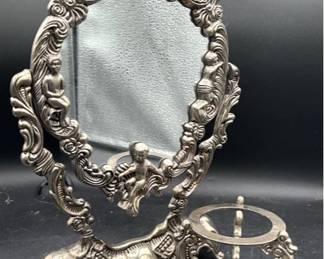 Vintage Silverplate Pair
Godinger silverplated Orb stand 3.5 x 3.5 in.
Vtg silverplated cherub vanity swivel tabletop mirror 9 x 12 in.