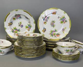 "Queen Victoria" green border china by Herend includes eight 10" dinner plates, six 9.5" cream soup bowls, eight 7.5" saucers, eight 6" bread and butter plates, five cups and saucers.