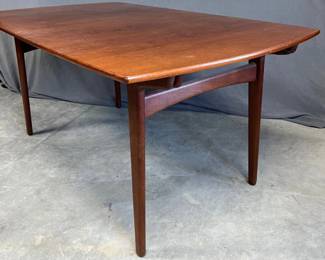 Danish teak dining table by Knud Andersen for JCA Jensen with two leaves