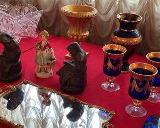 Mirrored trays, blue glassware.