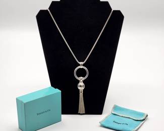 925 Vintage Tiffany & Co Necklace w /&nbsp;Tassel Charm
L 29 1/4in
W 3mm
Grams Necklace 20.55&nbsp;Estimated Melt Value: $17.09
Grams Charm 32.84&nbsp;Estimated Melt Value: $27.31
Buyer is responsible to pay for Shipping and Ins (See Shipping Details)