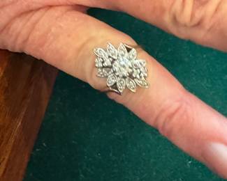 Gold and diamond ring.