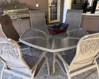 Metal and glass patio table