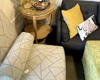 Custom upholstered lounge chairs with matching bolster pillow