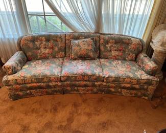 Elegant crescent-shaped sofa.......
