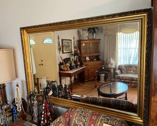 Large, framed wall mirror