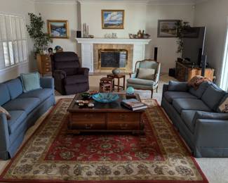 A traditional home filled with fine art, top quality furniture, haute couture apparel, and mementos from all over the world