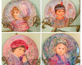 four Edna Hibel plates with boxes