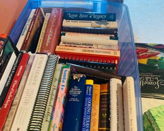 table filled with vintage cookbooks