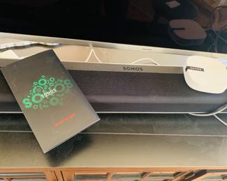 Sonos Surround sound system with sound bar and booster