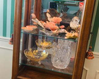 lighted display cabinet with doors on the sides