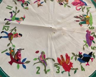 several examples of vintage Christmas including this 1960's 12 Days of Christmas tree skirt