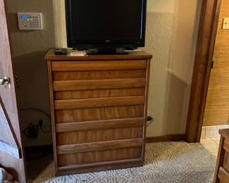 Tall chest of drawers. There is a matching dresser and mirror that coordinates with this as well.