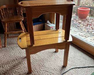 These tables are super cool. The top can be lifted off to be used as a tray by itself or put back together as a table.