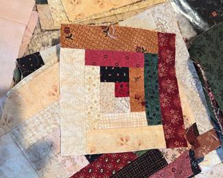 There are some more quilting squares that have already been sewn. Just waiting for someone to add their special touch.