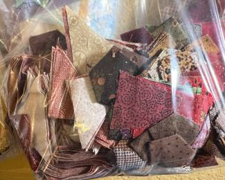 They have many bags of scraps and cut, ready to be put together fabric pieces