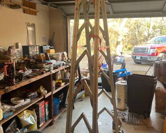 This is a collapsible folding ladder. Great when you don’t have a lot of space. 7 feet tall.