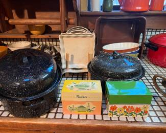 There are two vintage index boxes with lots of family recipes!  Lots of cookware as well