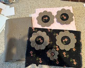 Wonderful fabric and quilting pieces which have already been made into flowers. You can add them to an existing quilt or continue working on putting something together with these pieces.!