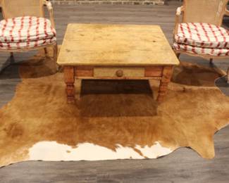 Cowhide Rug. $200.00. Table. $95.00. 39" x 36" x 17" h. Pair of Red Striped Chairs. $295.00