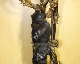 BUY IT NOW! $3750.00. Impressive pair of Bronze figural candelabra. Brown patinated and gilt, in form of the Middle Age armored knights, one in mailshirt(hauberk) with sabre, the other in plate armor resting on crossbow, each standing on double square base with four helmets, surmounted by crossed weapons and round disc applied with fight implements and mask, issuing two tier of seven horn-shaped arms topped with candle lights, and a pike finial with Minerva portrait medallion. Height 45 inches. See more detailed pictures below.