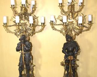 BUY IT NOW! $3750.00. Impressive pair of Bronze figural candelabra. Brown patinated and gilt, in form of the Middle Age armored knights, one in mailshirt(hauberk) with sabre, the other in plate armor resting on crossbow, each standing on double square base with four helmets, surmounted by crossed weapons and round disc applied with fight implements and mask, issuing two tier of seven horn-shaped arms topped with candle lights, and a pike finial with Minerva portrait medallion. Height 45 inches. See more detailed pictures below.