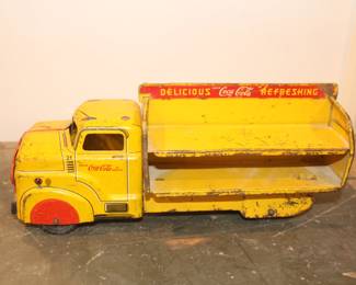 Vintage metal Coca Cola delivery truck.