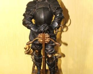 BUY IT NOW! $3750.00. Impressive pair of Bronze figural candelabra. Brown patinated and gilt, in form of the Middle Age armored knights, one in mailshirt(hauberk) with sabre, the other in plate armor resting on crossbow, each standing on double square base with four helmets, surmounted by crossed weapons and round disc applied with fight implements and mask, issuing two tier of seven horn-shaped arms topped with candle lights, and a pike finial with Minerva portrait medallion. Height 45 inches.