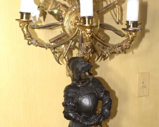 BUY IT NOW! $3750.00. Impressive pair of Bronze figural candelabra. Brown patinated and gilt, in form of the Middle Age armored knights, one in mailshirt(hauberk) with sabre, the other in plate armor resting on crossbow, each standing on double square base with four helmets, surmounted by crossed weapons and round disc applied with fight implements and mask, issuing two tier of seven horn-shaped arms topped with candle lights, and a pike finial with Minerva portrait medallion. Height 45 inches. See more detailed pictures below.