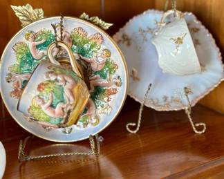 Capodimonte and Limoges cups and saucers.