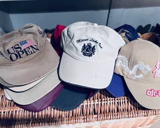 Baseball caps from golf tournaments and courses 