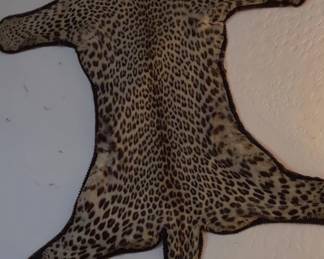 Pre ban antique cheetah rug