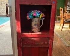 Rustic cabinet with red finish
