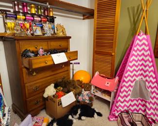 More toys...... note the chest of drawers in the background and the ribbon organizer filled with spools of ribbons ready for making wreaths and halos for Fiesta.