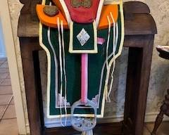 Decorative saddle and saddle stand