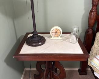 Marble top side table w/ white and grey slag glass lampshade