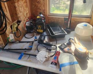 Barn full of garden items and tools.