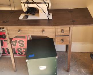 Sewing machine and cabinet.
