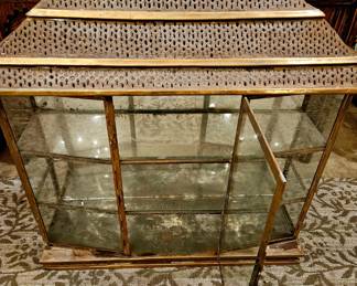 Beautiful brass and bronze shelving display unit