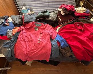 Thousands of Vintage Graphic Tees and Clothing. Most unworn with original tags. 
