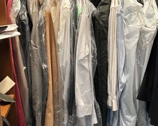 Great selection of dress shirts and suits for men. Most unworn and with original tags. 
