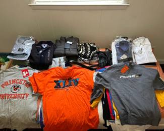 Thousands of Vintage Graphic Tees and Clothing. Most unworn with original tags. 
