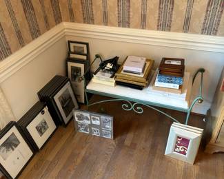 Unused picture frames and photo albums in all shapes and sizes