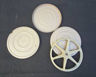 Two Vintage Film Reels With Metal Cases